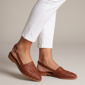 Ornella woven slingback flats in Brown on a light gray studio backdrop