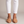 Ornella woven slingback flats in Light Brown on a light gray studio backdrop