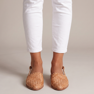 Ornella woven slingback flats in Light Brown on a light gray studio backdrop