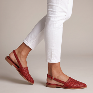 Ornella woven slingback flats in Red on a light gray studio backdrop