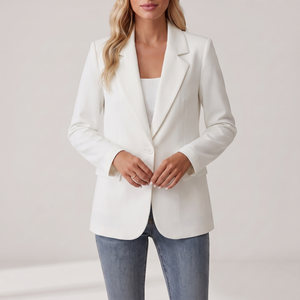 Perrine single button blazer in White on a light gray studio backdrop