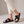 Pilar toe loop slide sandals in Black with crisscross mesh straps on a light gray studio backdrop