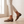 Portia leopard print loafers worn with cream cropped trousers, walking across an oak floor
