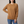 Rita raglan crew neck sweatshirt in Camel on a light gray studio backdrop