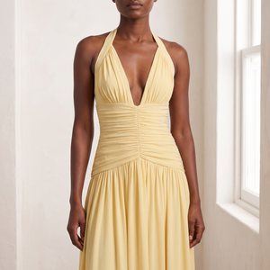 Front view of the ruched bodice and deep V halter neckline of the Rosalyn maxi dress in Yellow