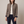 Rosamund wool blazer in Brown with navy contrast edging and a stand collar, worn open over a cream top