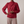 Solange draped mock neck blouse in Red on a light gray studio backdrop