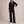 Suzanne half zip knit set in Black on a light gray studio backdrop