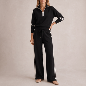 Suzanne half zip knit set in Black on a light gray studio backdrop