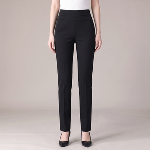 Sylvia high waist dress pants in Black on a light gray studio backdrop
