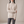 Verity lattice knit turtleneck sweater in Beige on a light gray studio backdrop