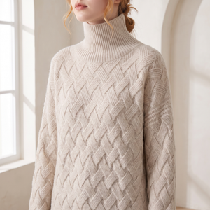 Close view of the tall ribbed collar and lattice knit on the Verity lattice knit turtleneck sweater in Beige