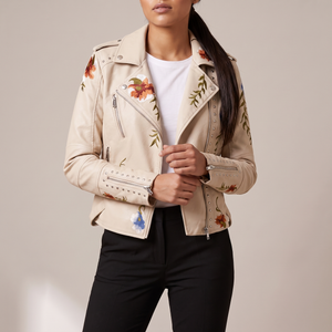 Victoire embroidered leather moto jacket in Cream on a light gray studio backdrop