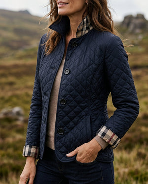 Winona quilted jacket in Navy Blue, worn outdoors