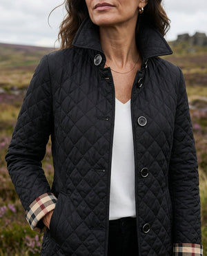 Winona quilted jacket in Black, worn outdoors